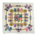 A Hermes Paris 'Les Rubans Du Cheval' silk square scarf. Designed by Joachim Metz for Hermes.