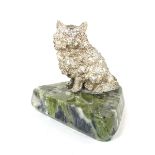 A silver model of a cat on a green marble plinth, 20th century.