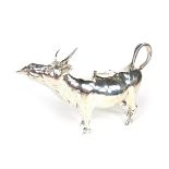 A silver cow creamer, 20th century. Mark of Israel Freeman & Son Ltd., London 1979. 7 in (17.