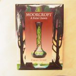 A Moorcroft signed book entitled 'A New Dawn' by Fraser Street.