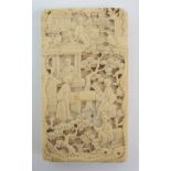 A Chinese ivory card case decorated all-over with figures amongst trees and pavilions, 8.5 x 4.7cm