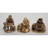 A Japanese ivory netsuke with a drummer seated on an elephant,4cm high, a netsuke of two figures