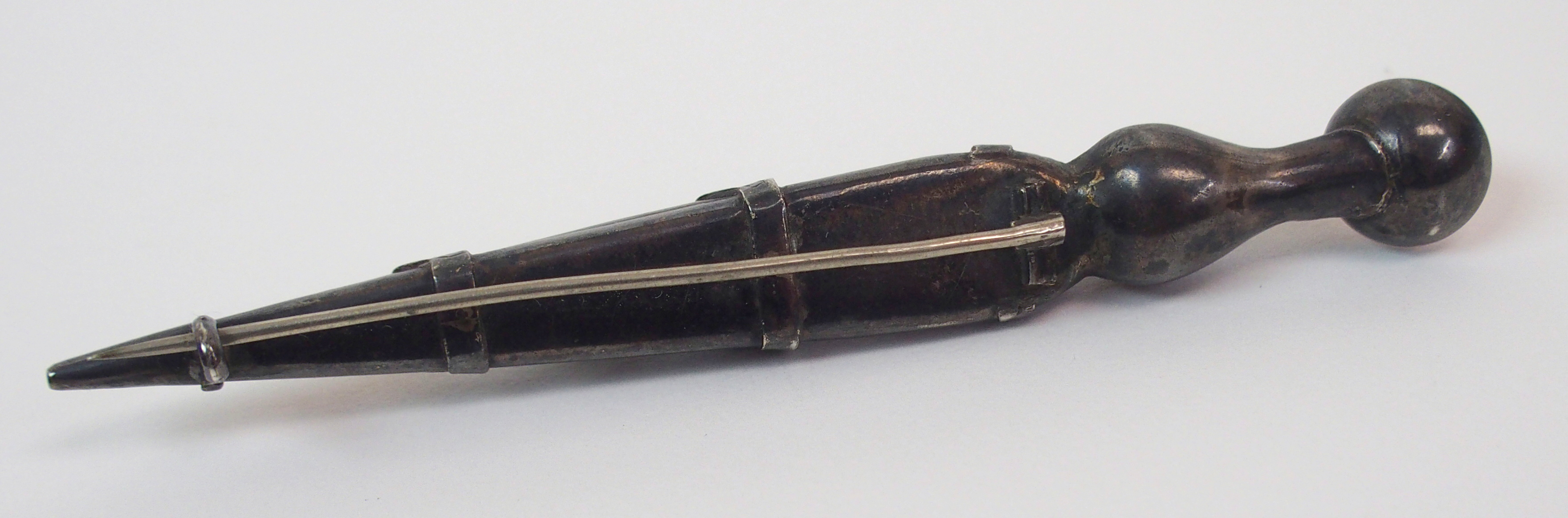 A Victorian Scottish agate kilt pin modelled as a dirk, with a white metal clan badge 'Iste Patriam, - Image 4 of 8