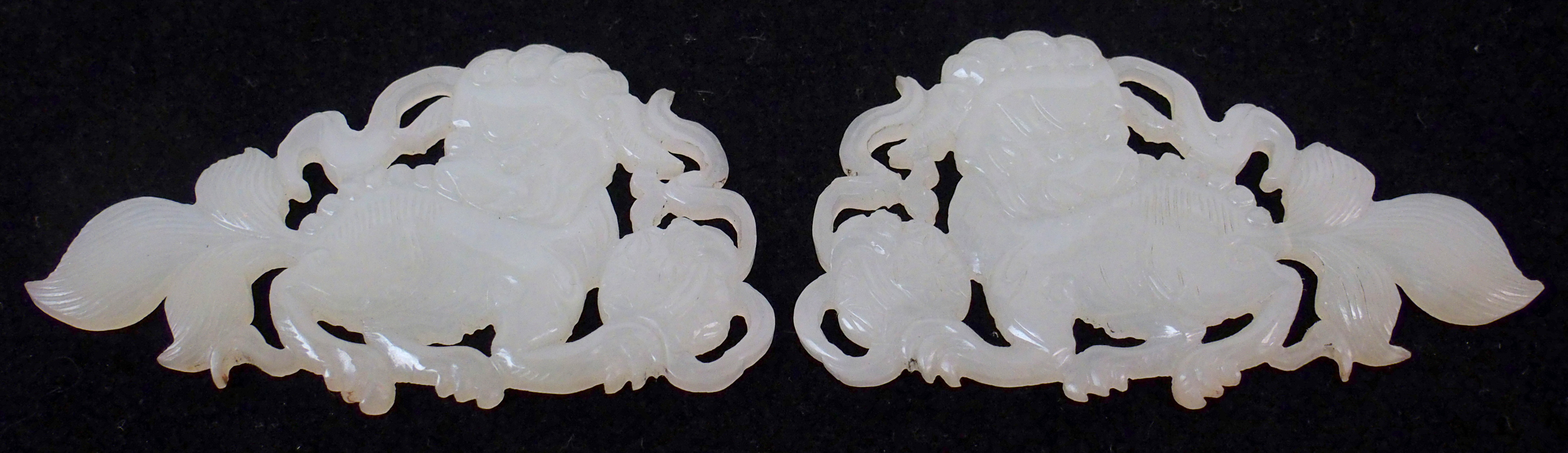 Two Chinese jade mounts carved as shishi with brocade balls and ribbons, 5.5cm wide and an Indian - Image 10 of 10