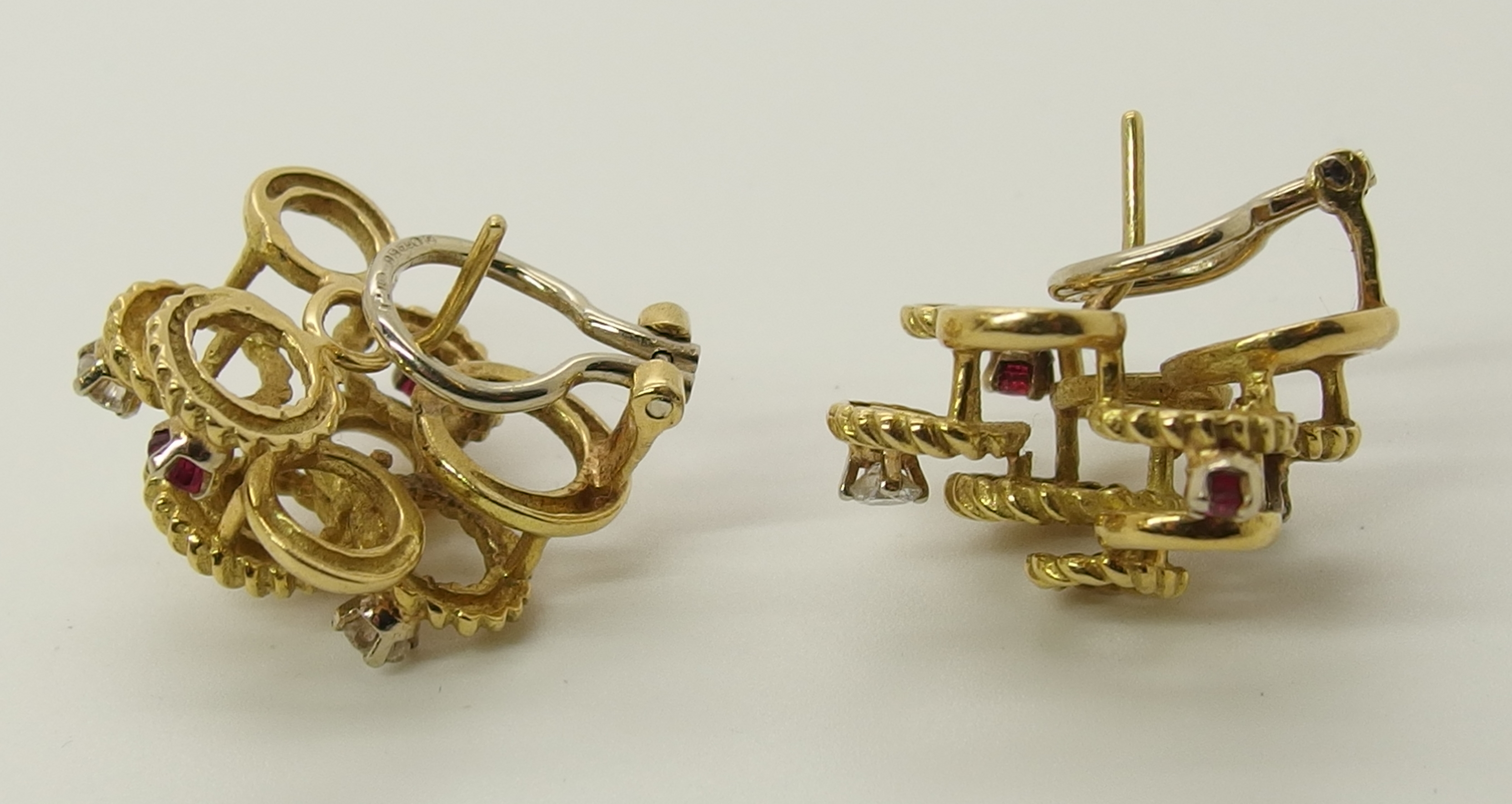 A pair of 18ct gold ruby and diamond earrings of interlinked circle design, with clip and post - Image 4 of 4
