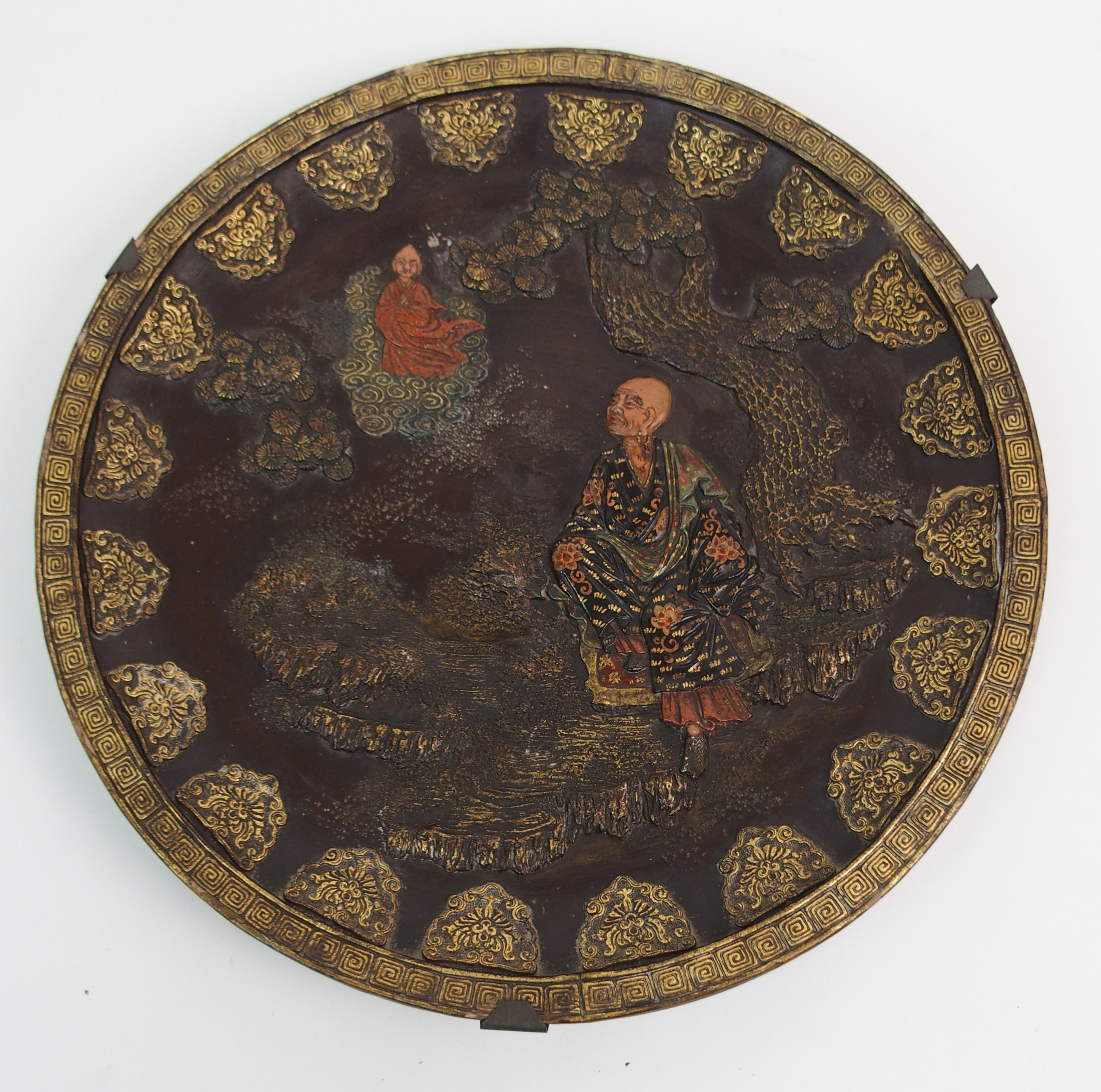 A JAPANESE POTTERY DISH in the Komai style moulded with a deity and devotee amongst pine (rim - Image 8 of 10