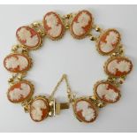 AN 18CT ITALIAN MADE GOLD CAMEO BRACELET featuring ten hand carved shell cameos of ladies in