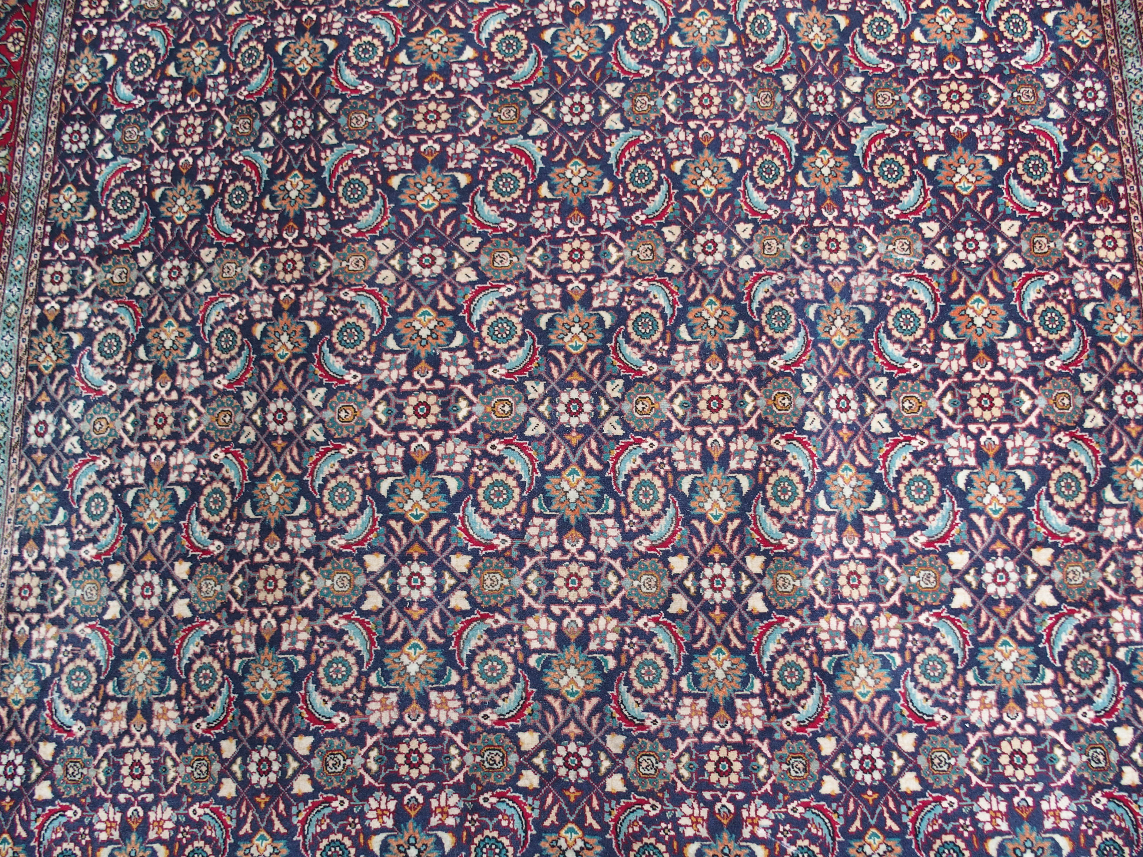 A HAMADAN BLUE GROUND RUG with allover design with red border, 188cm x 272cm Condition Report: - Image 3 of 6