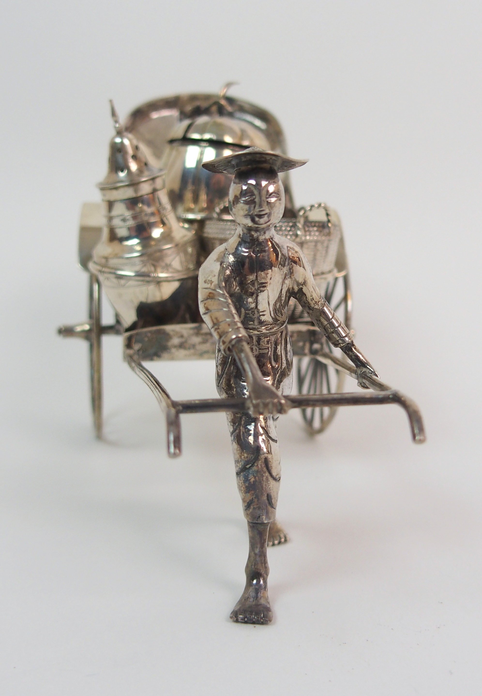 A CHINESE SILVER RICKSHAW CRUET of traditional type with salt, pepper and mustard pot, the carriage, - Image 3 of 10