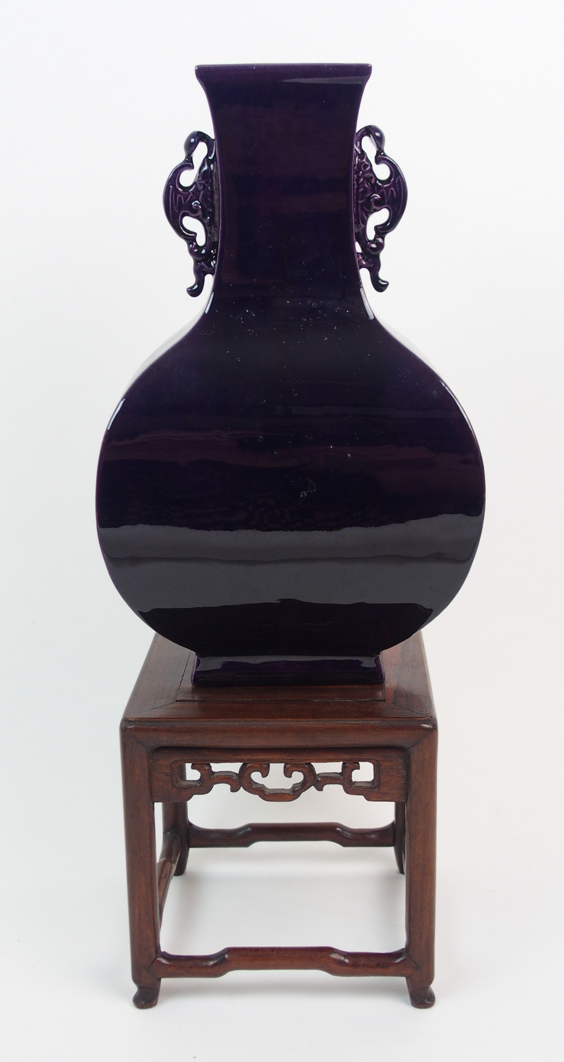 A CHINESE MONOCHROME SQUARE BALUSTER SHAPED VASE with pierced handles, 20th Century, 28cm high and a