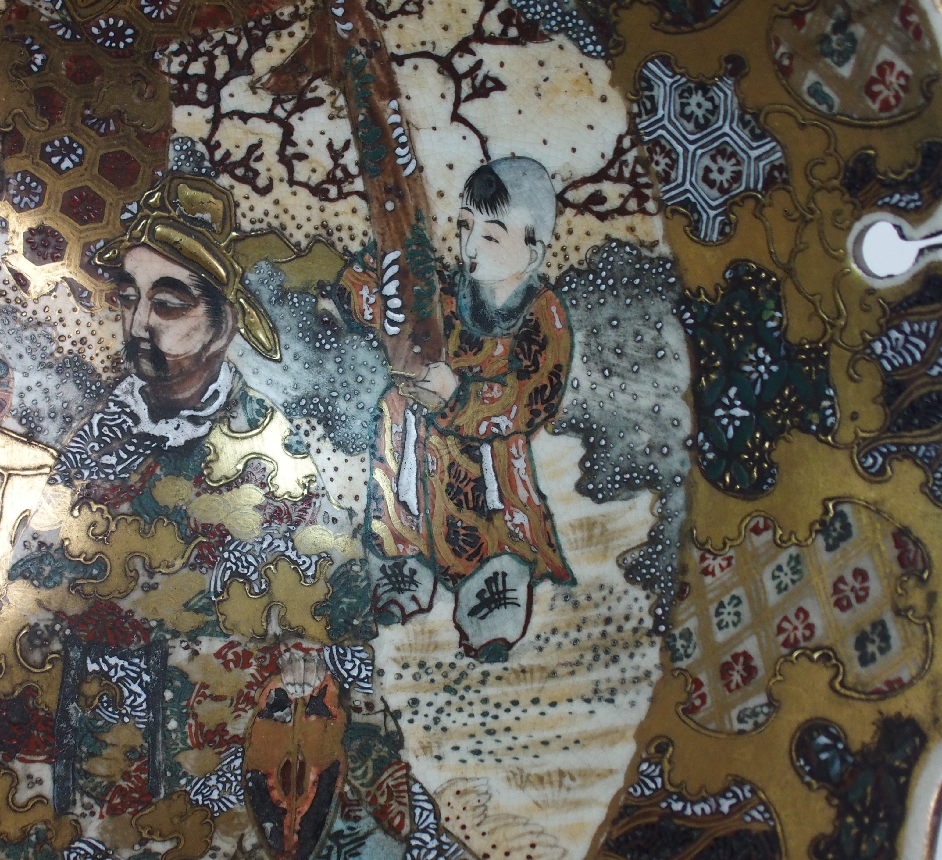 A SATSUMA BOWL painted with figures in a garden within gilt brocade border and pierced foliate - Image 6 of 10
