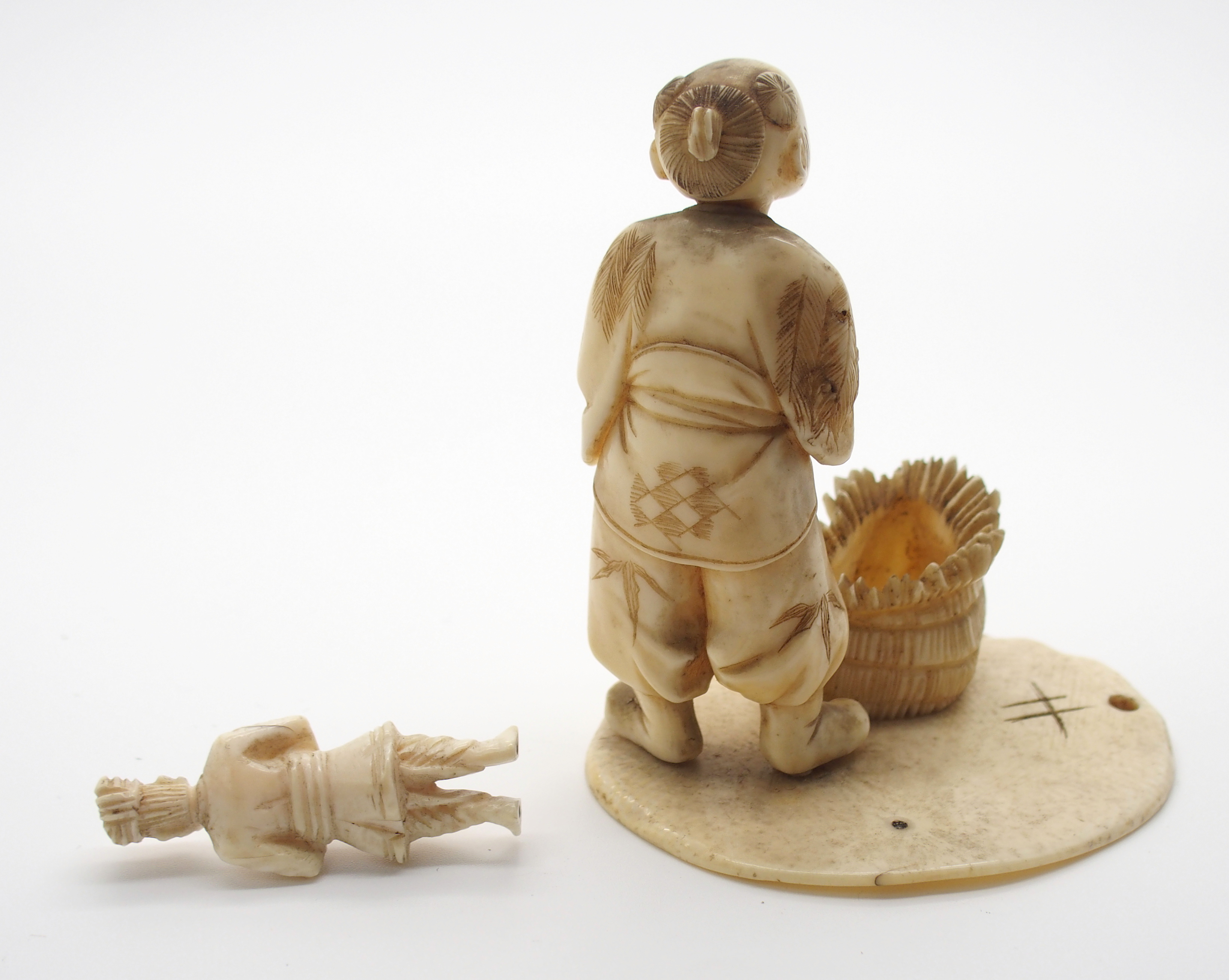 A JAPANESE IVORY OKIMONO ONI holding a temple bell enclosing another demon, 5cm high, a netsuke of a - Image 9 of 10