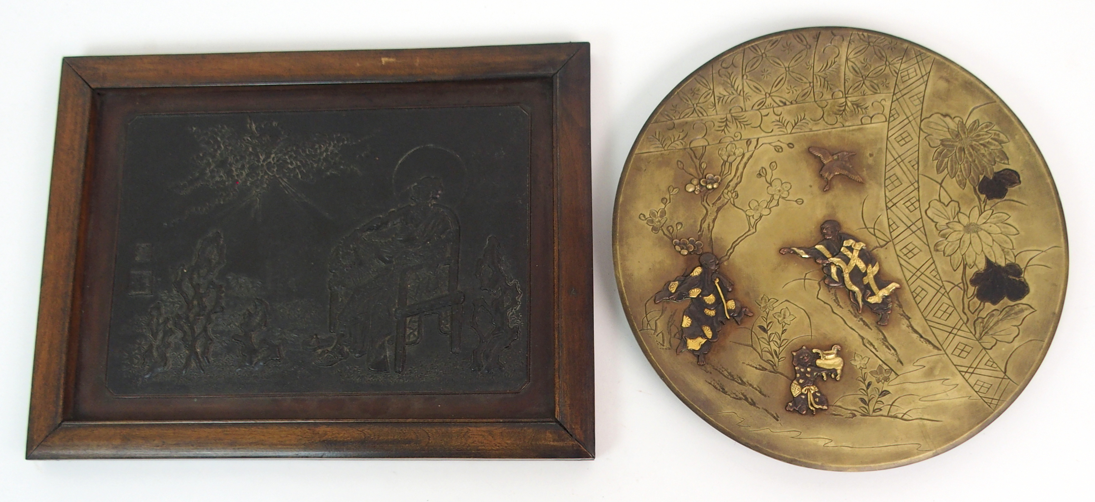 A KOMAI STYLE MIXED METAL CIRCULAR PLAQUE decorated with symbolic imaging, 27cm diameter and a