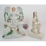 A 19TH CENTURY STAFFORDSHIRE FIGURAL GROUP OF HIBERNIA AND BRITANNIA The figures of Hibernia and