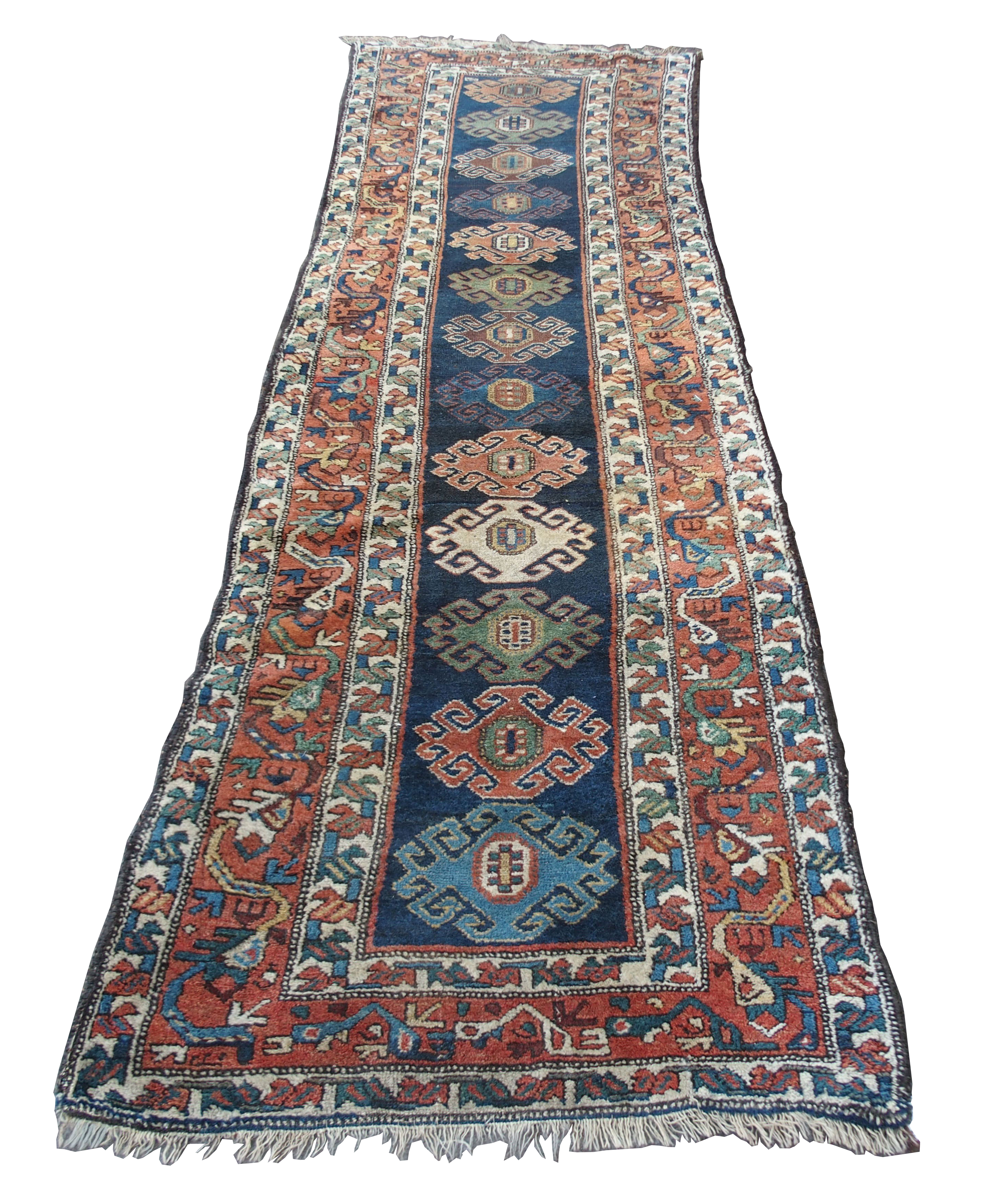 A CAUCASIAN BLUE GROUND RUNNER with nine central medallions and geometric border, 474cm x 96cm and - Image 7 of 10