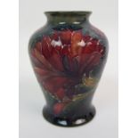 A WILLIAM MOORCROFT SPANISH PATTERN VASE of miniature form, with green painted signature and