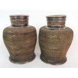 A PAIR OF CHINESE WHITE METAL AND WOVEN TEA CADDIES the decagonal bound bodies with circular