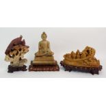 A CHINESE SOAPSTONE CARVING OF BUDDHA 17.5cm high, wood stand, peacock and hen on rockwork, 17cm