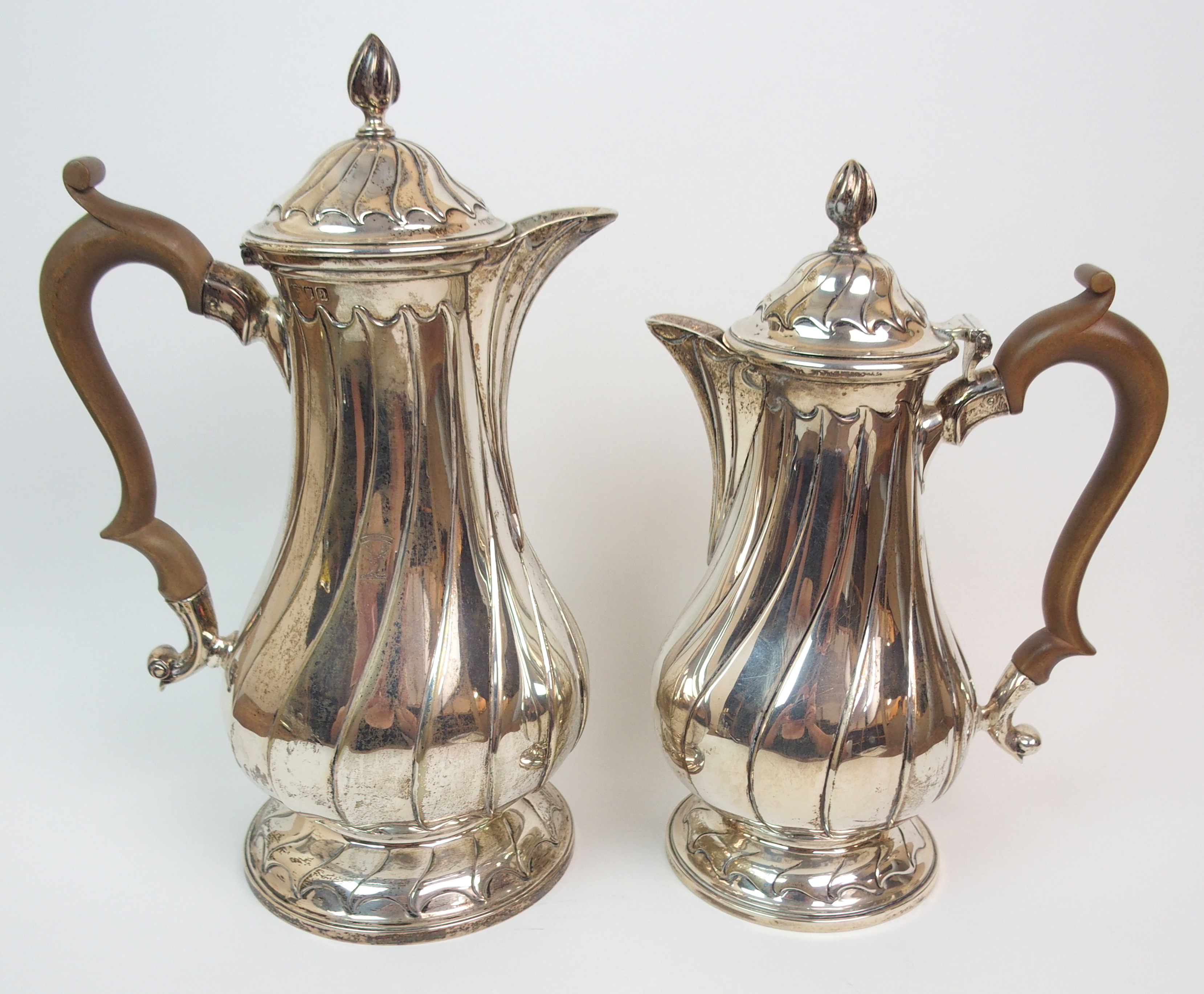 A LATE VICTORIAN TWO-PIECE SILVER CAFE AU LAIT SET makers marks TBT, London 1896 and 1898 of