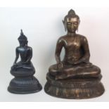 A BRONZED MODEL OF BUDDHA of traditional type, seated on a high lotus throne, 62cm high and