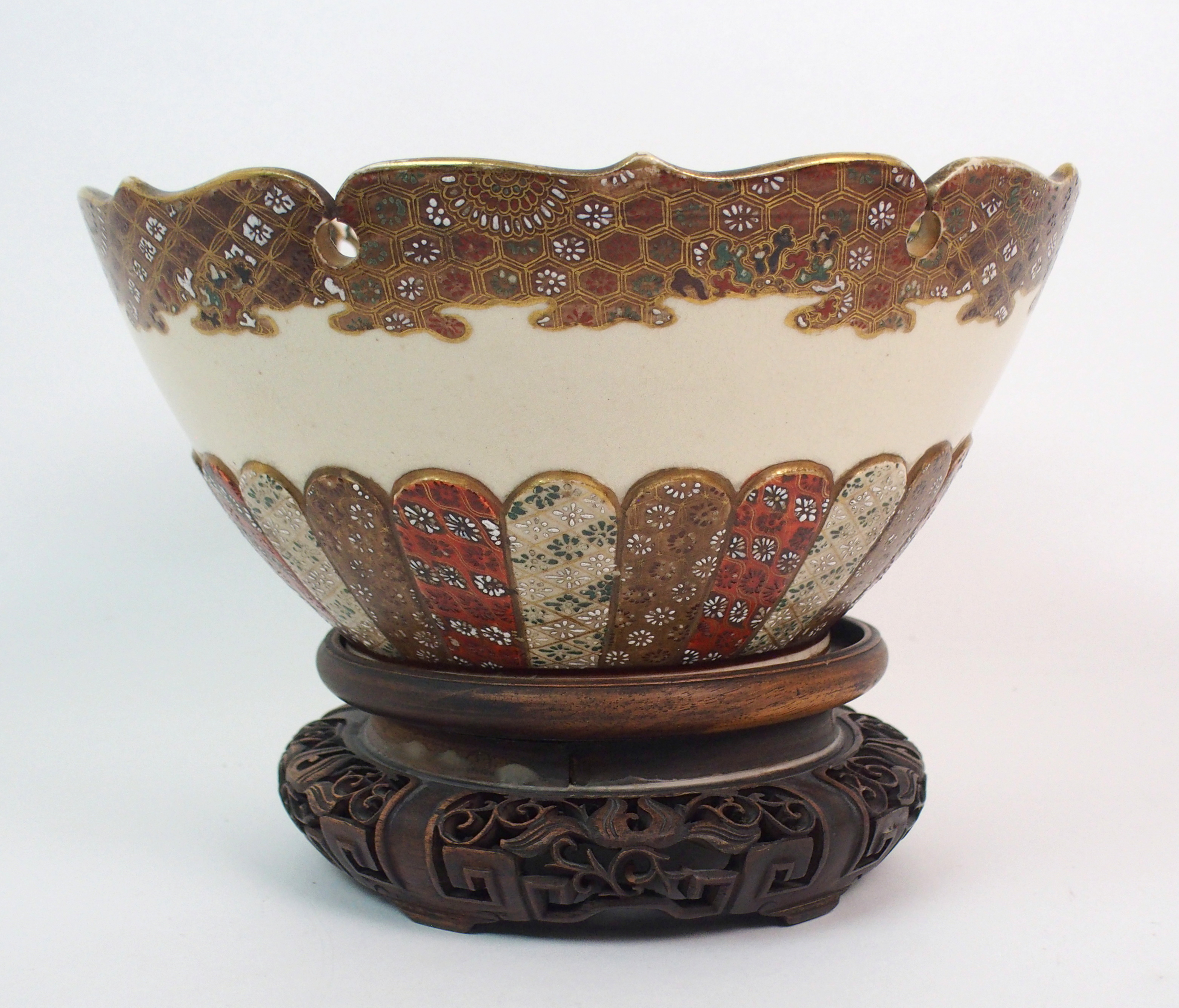 A SATSUMA BOWL painted with figures in a garden within gilt brocade border and pierced foliate - Image 2 of 10