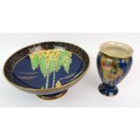 A CARLTON WARE FOREST TREE PATTERN FRUIT BOWL on stand, 25.5cm diameter and a Crown Devon