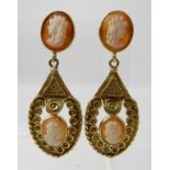A PAIR OF 18CT GOLD CAMEO EARRINGS with decorative mounts, post and butterfly fitting. Stamped 750