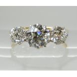 AN 18CT GOLD THREE STONE DIAMOND RING of classic claw set style, diamonds estimated approx