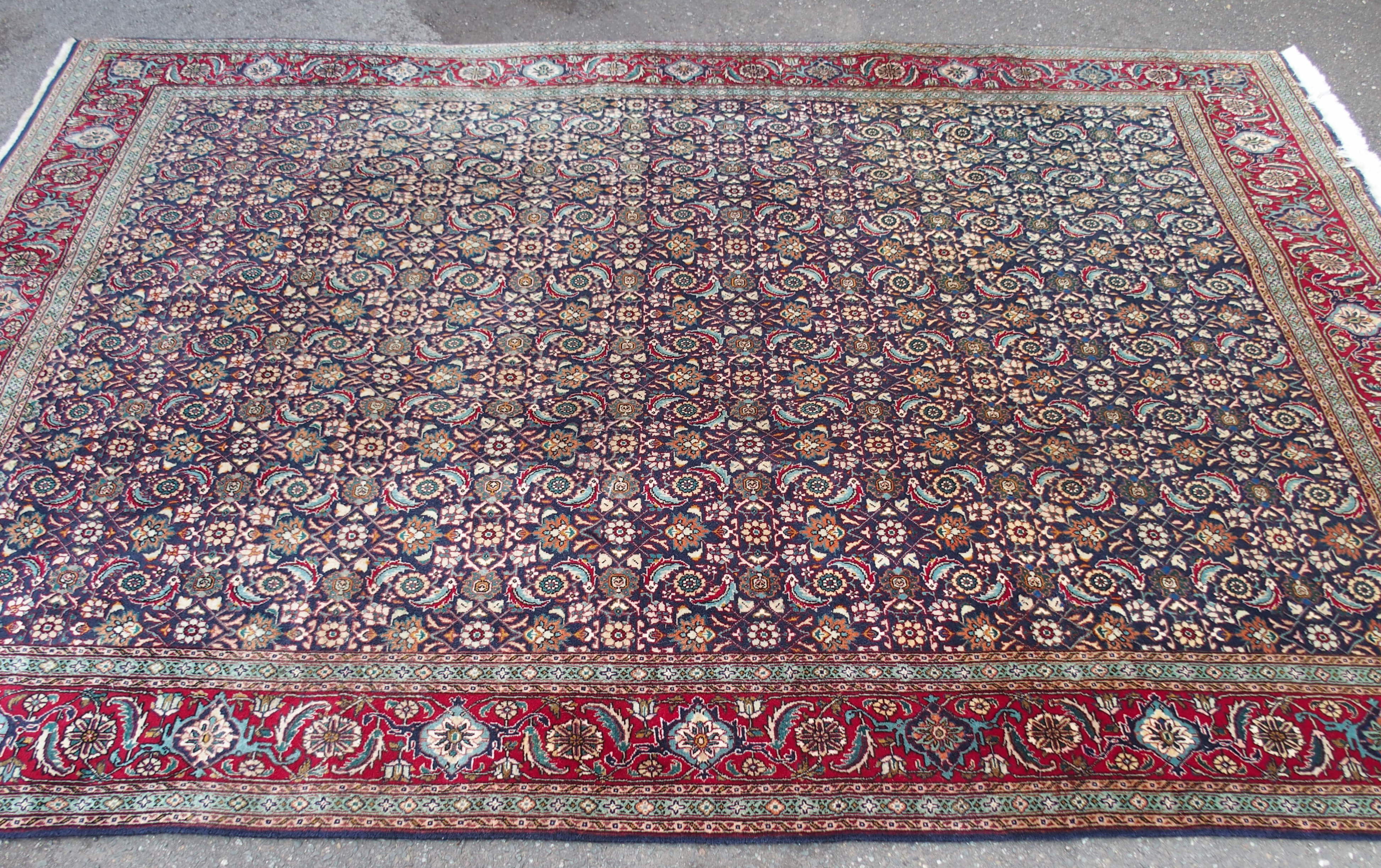 A HAMADAN BLUE GROUND RUG with allover design with red border, 188cm x 272cm Condition Report: - Image 5 of 6