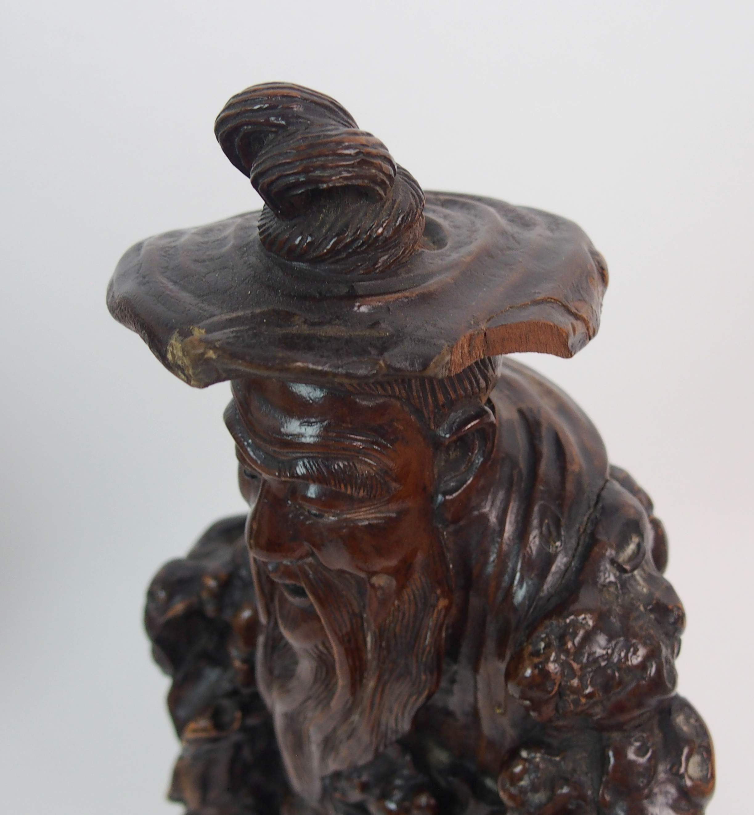 A JAPANESE POTTERY DISH in the Komai style moulded with a deity and devotee amongst pine (rim - Image 4 of 10