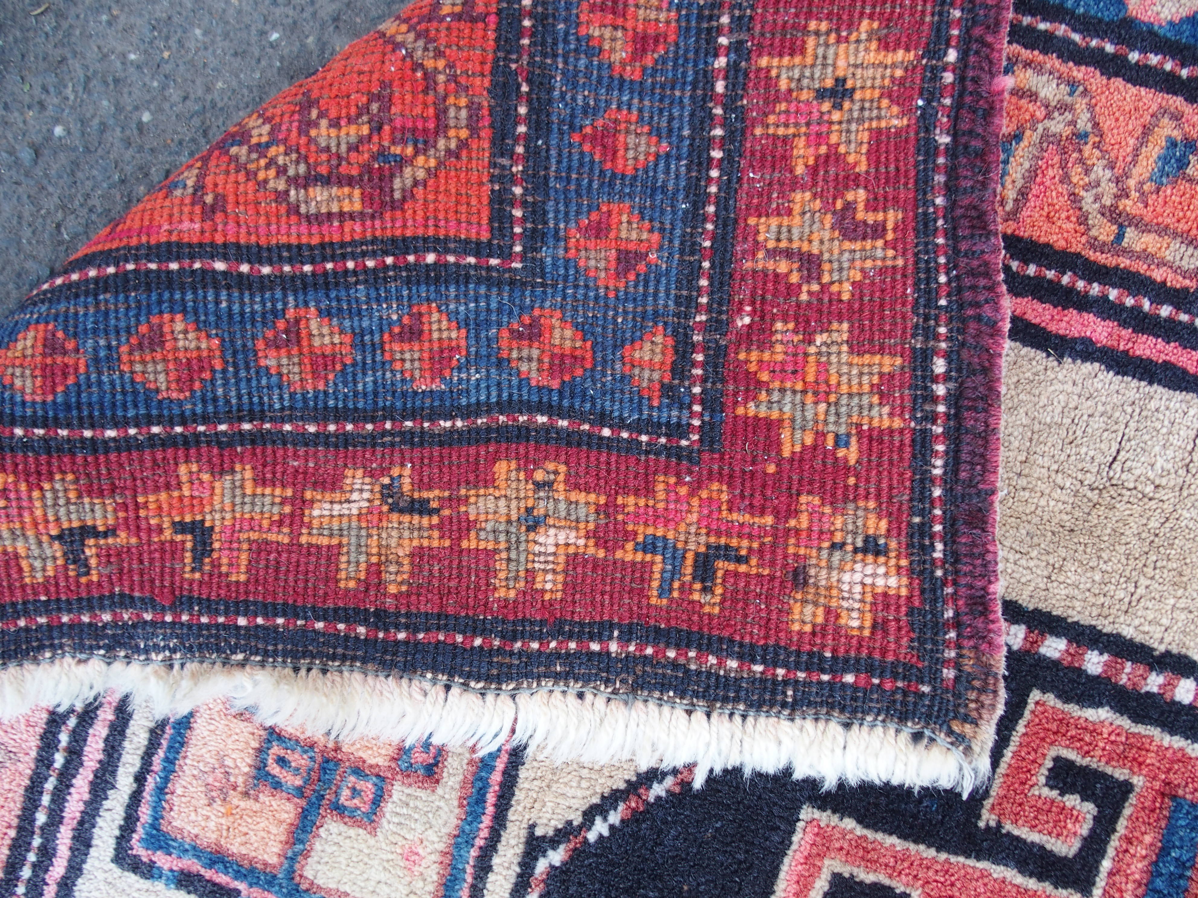 AN ARAAK RED GROUND RUG with multiple borders, 320cm x 150cm and an Eastern rug with four central - Image 10 of 10