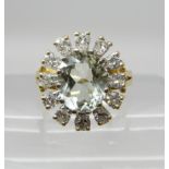 AN 18CT GOLD GREEN AMETHYST AND DIAMOND CLUSTER RING dimensions of the amethyst, 10mm x 8mm x 5.3mm,