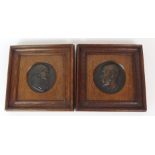 A PAIR OF BRONZE CIRCULAR PORTRAIT PLAQUES depicting the profiles of an elderly gentleman and an
