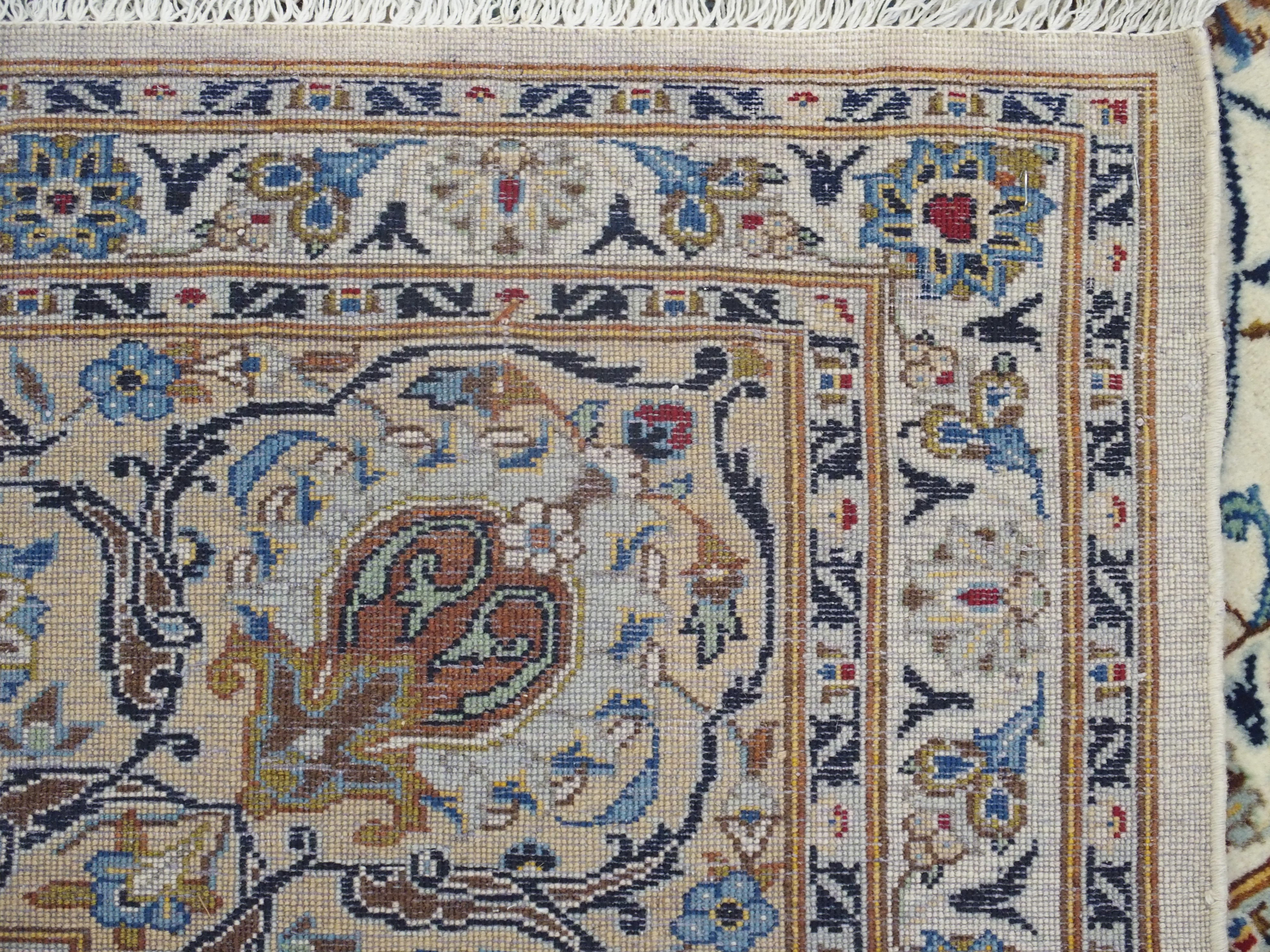 A CREAM GROUND FINE KASHAN RUG with allover floral design and floral palmette border, 353cm x - Image 5 of 5