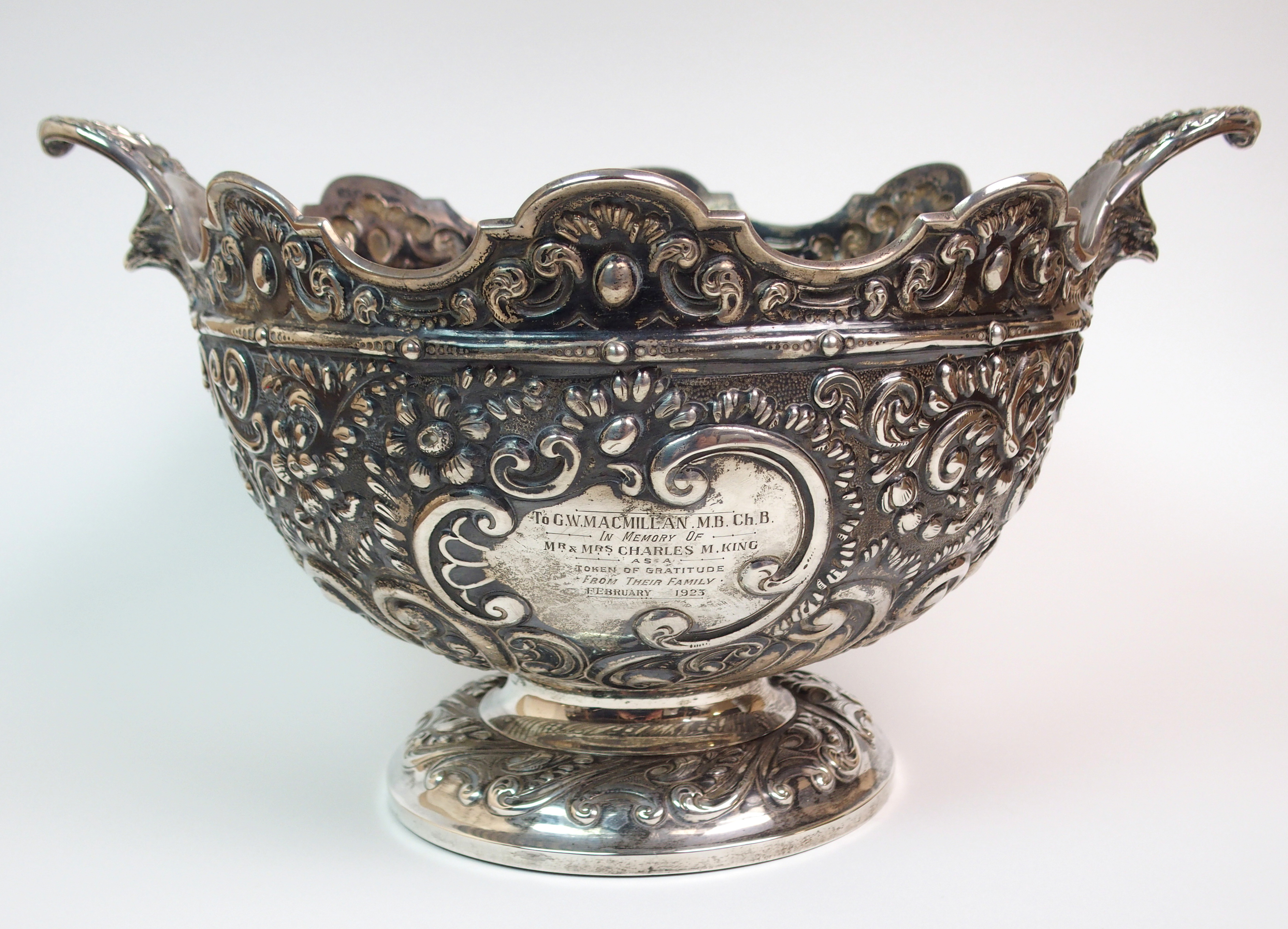 A VICTORIAN SILVER PUNCH BOWL maker's marks FS, London 1890, of circular form in Monteith style with