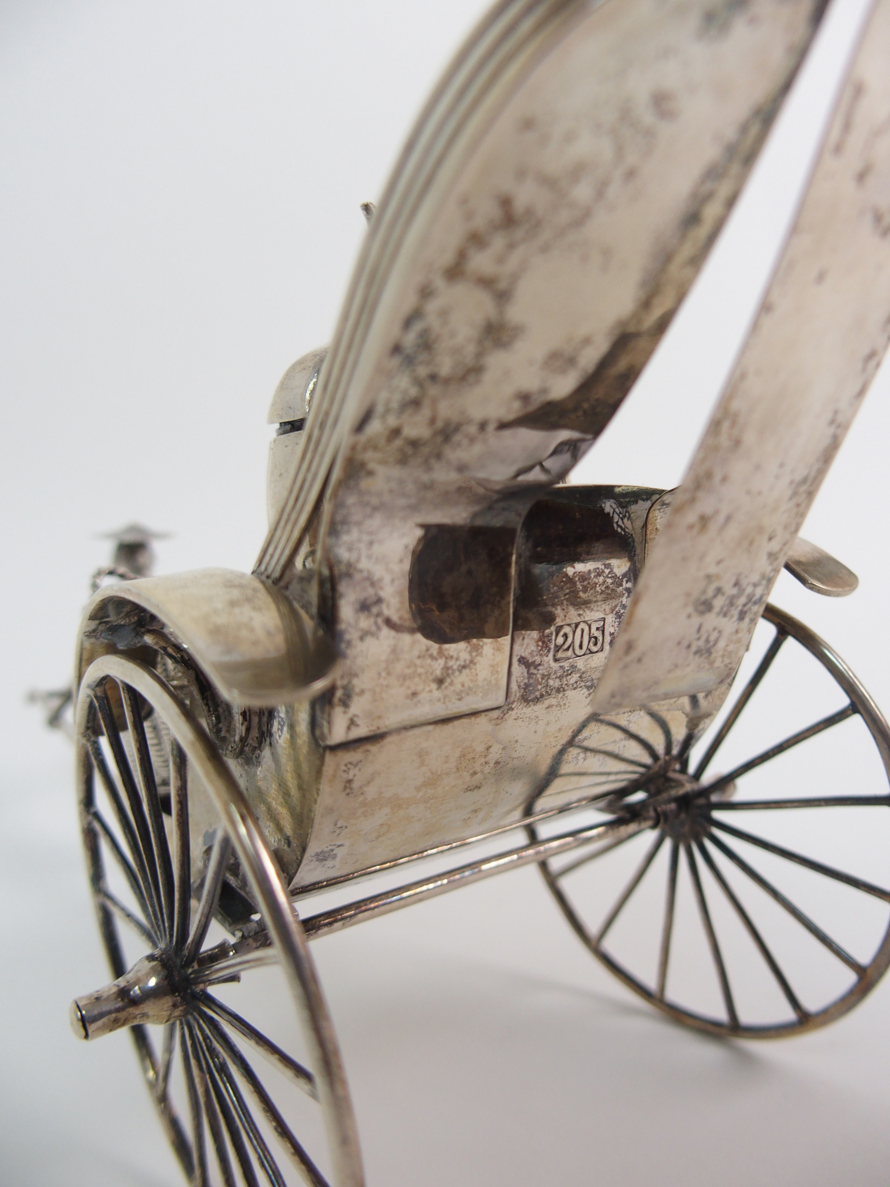 A CHINESE SILVER RICKSHAW CRUET of traditional type with salt, pepper and mustard pot, the carriage, - Image 6 of 10