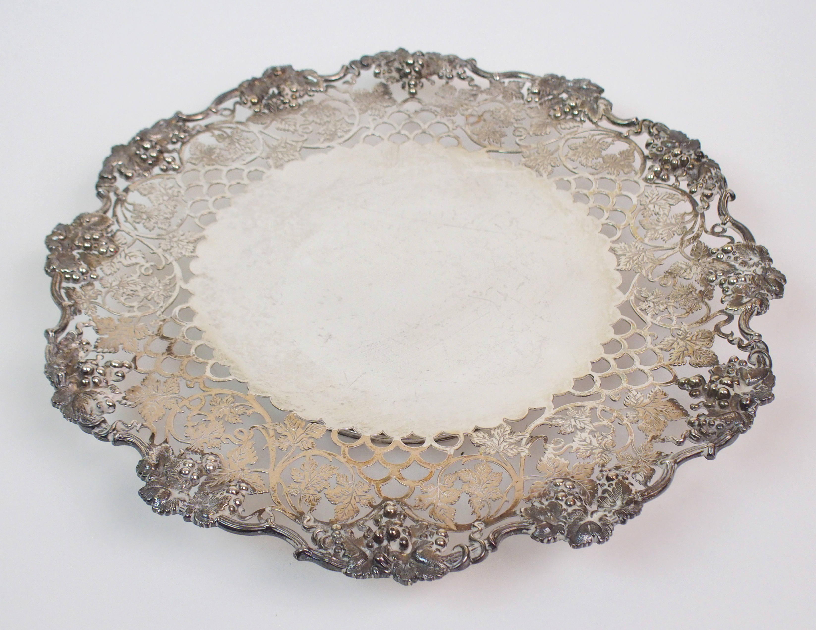 A SILVER FRUIT DISH by James Dixon & Sons, Sheffield 1946, of circular form, the scalloped rim