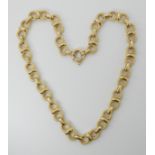 AN 18CT ITALIAN MADE FANCY NECKCHAIN of textured circular links and polished bars, length 46cm,