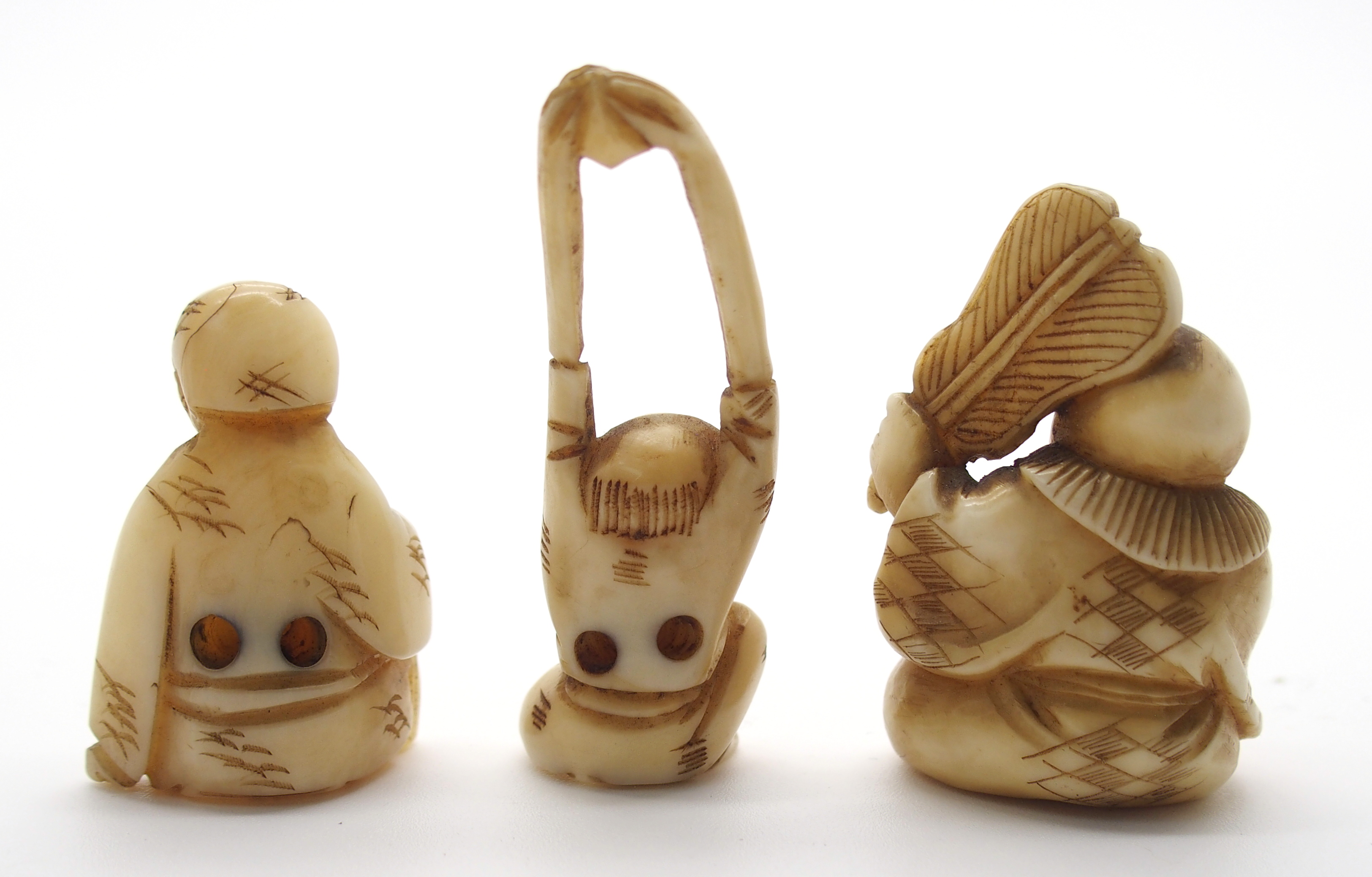 A JAPANESE IVORY OKIMONO ONI holding a temple bell enclosing another demon, 5cm high, a netsuke of a - Image 6 of 10