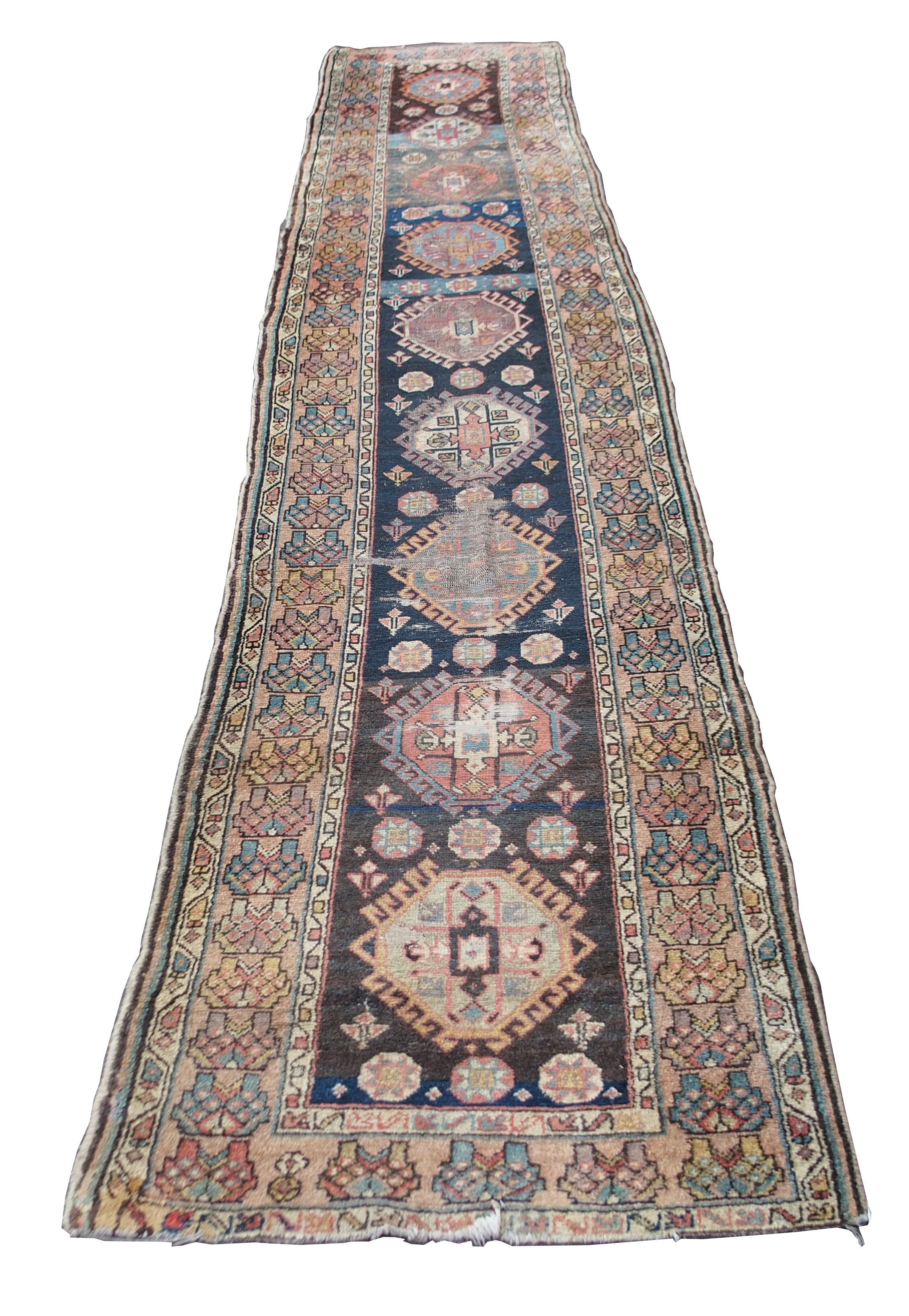 A CAUCASIAN BLUE GROUND RUNNER with nine central medallions and geometric border, 474cm x 96cm and - Image 2 of 10