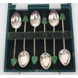 A SET OF SIX CHINESE SILVER TEASPOONS each set with a hardstone carving of Buddha, stamped Tack