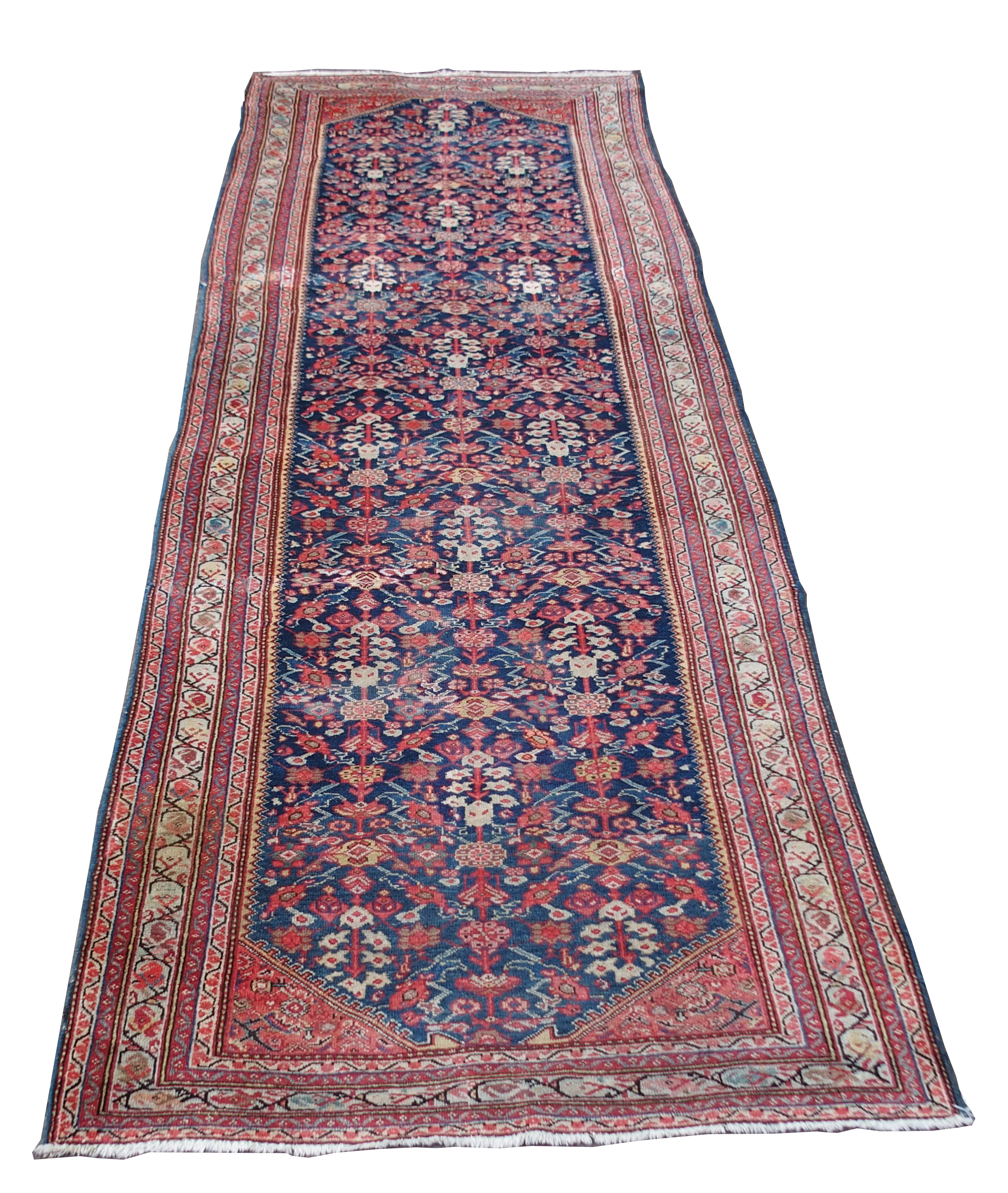 A HAMADAN BLUE GROUND RUNNER with allover design and multiple borders, 393cm x 134cm Condition