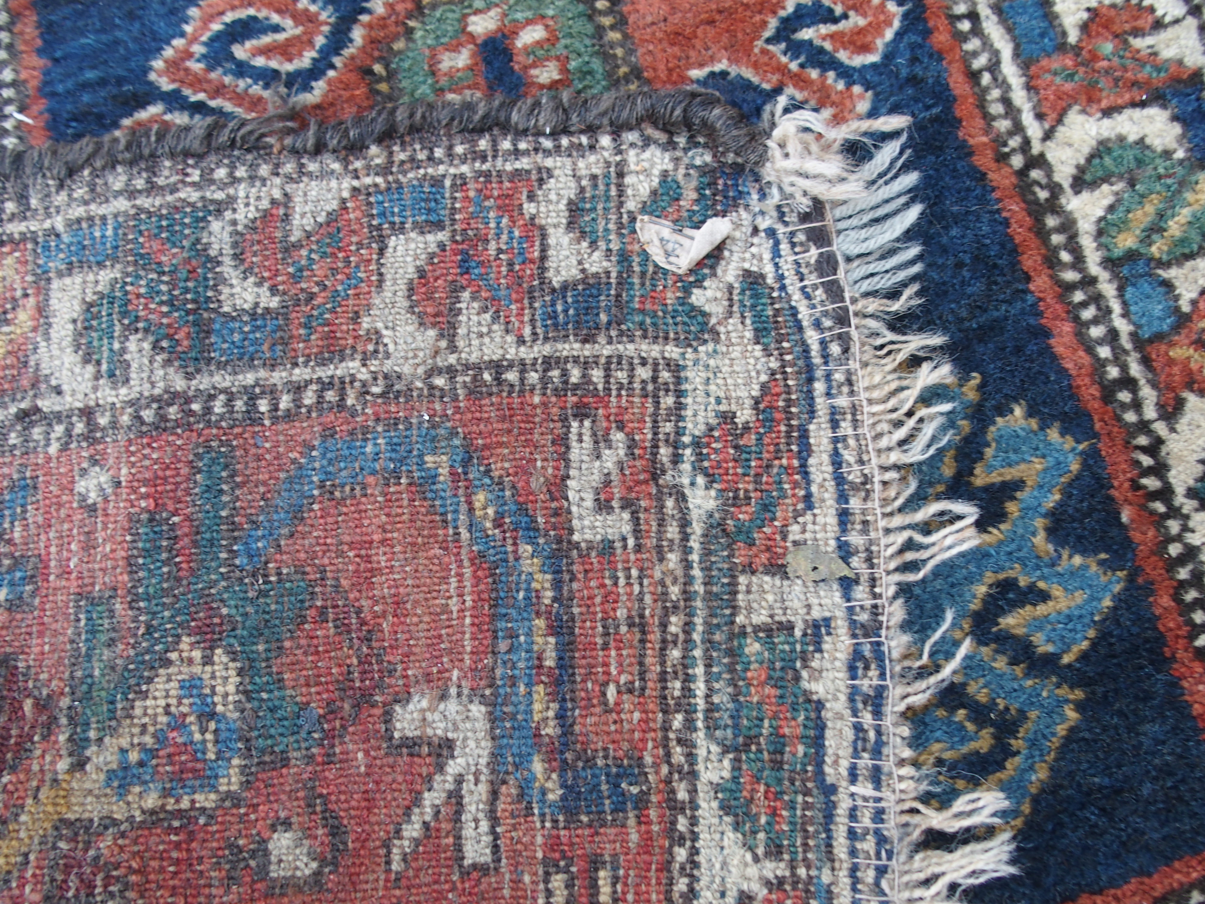 A CAUCASIAN BLUE GROUND RUNNER with nine central medallions and geometric border, 474cm x 96cm and - Image 10 of 10