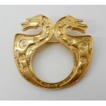 A 9CT GOLD OLA GORIE MYTHICAL BEASTS BROOCH with embossed detail, dimensions 4cm x 3.8cm, weight