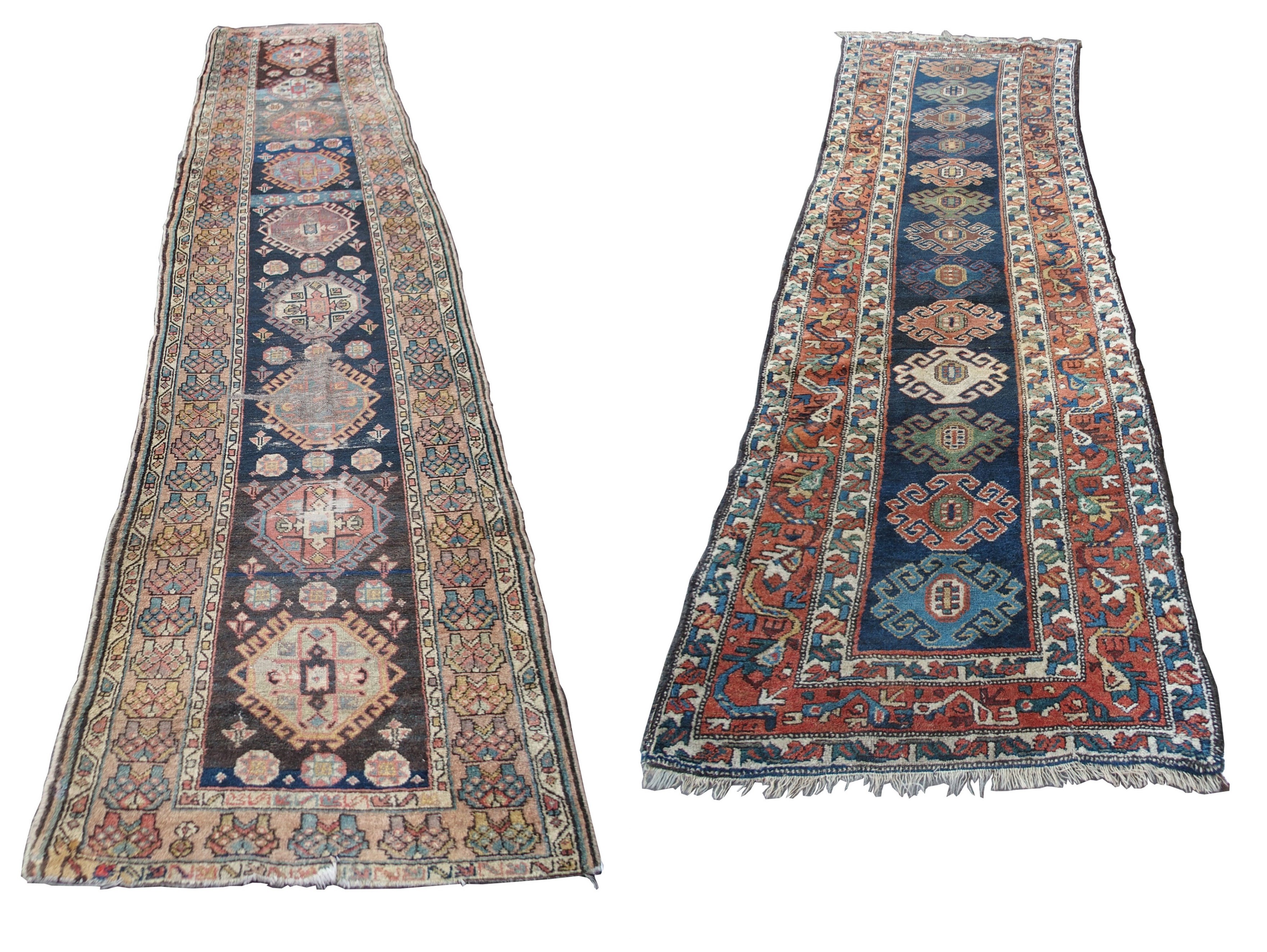 A CAUCASIAN BLUE GROUND RUNNER with nine central medallions and geometric border, 474cm x 96cm and
