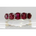 AN 18CT GOLD FIVE STONE RUBY RING the five cushion cut rubies range in size from 4.5mm x 3.5mm x 2.