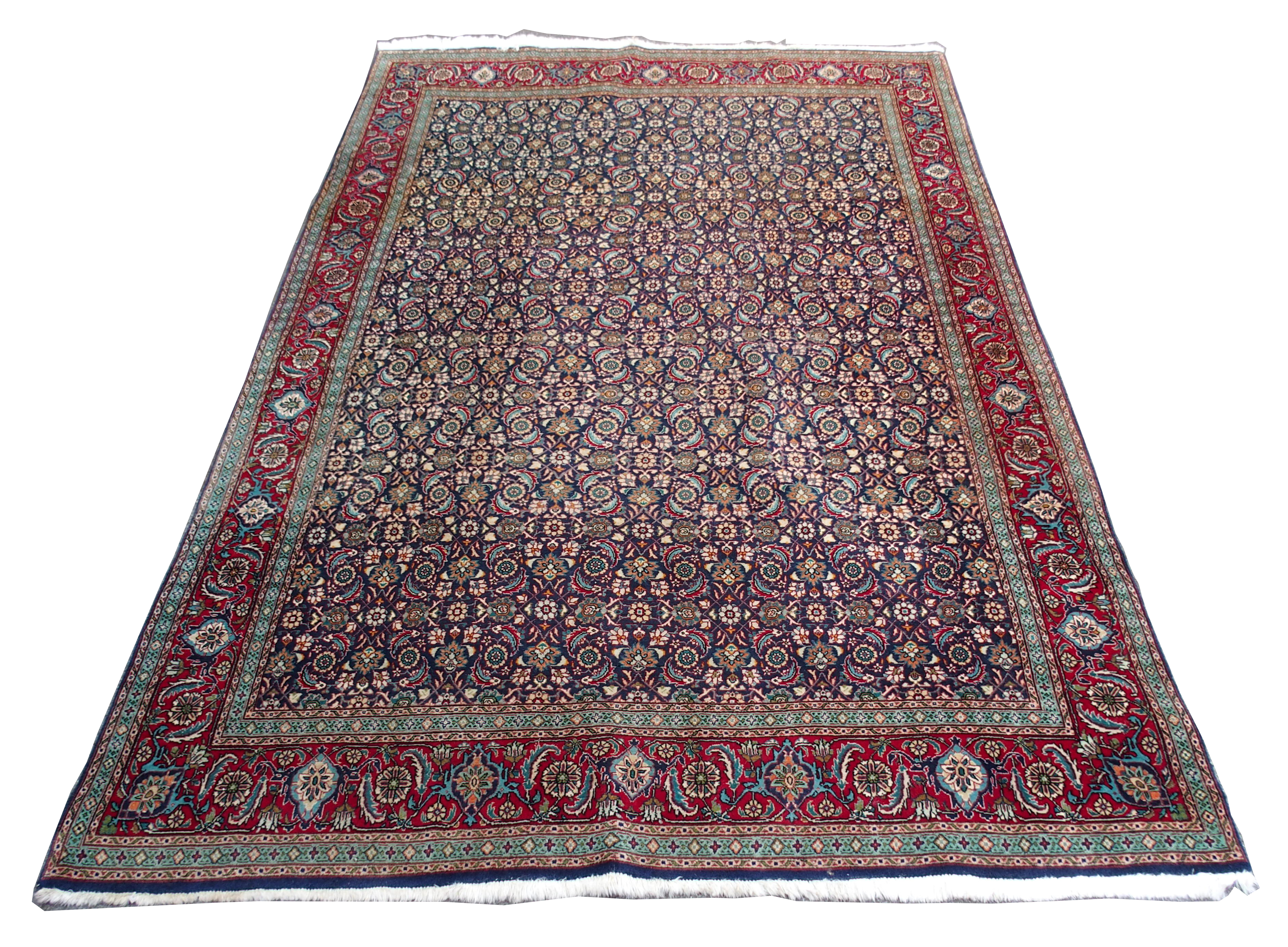 A HAMADAN BLUE GROUND RUG with allover design with red border, 188cm x 272cm Condition Report: