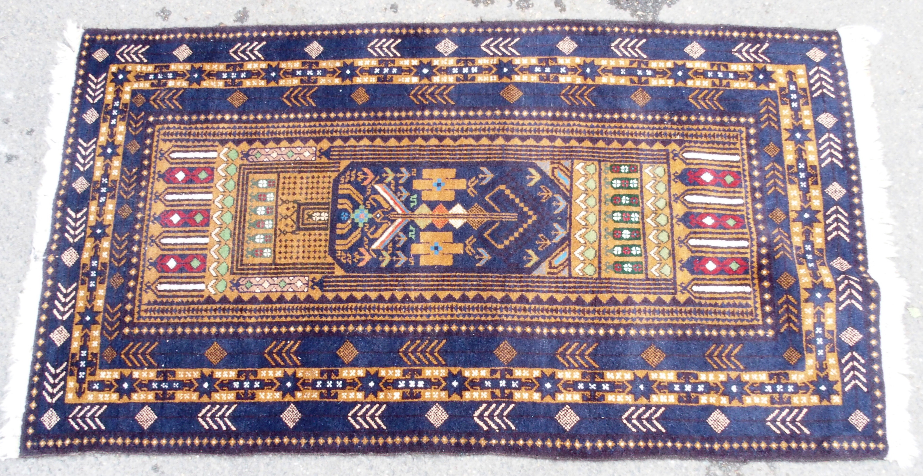 A QUASQAI RUG with ten columns with geometric design, 213cm x 127cm and a blue ground Eastern rug - Image 8 of 10