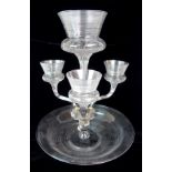 A VICTORIAN GLASS EPERGNE the ribbed glass bowl base with central thistle shaped flute and three