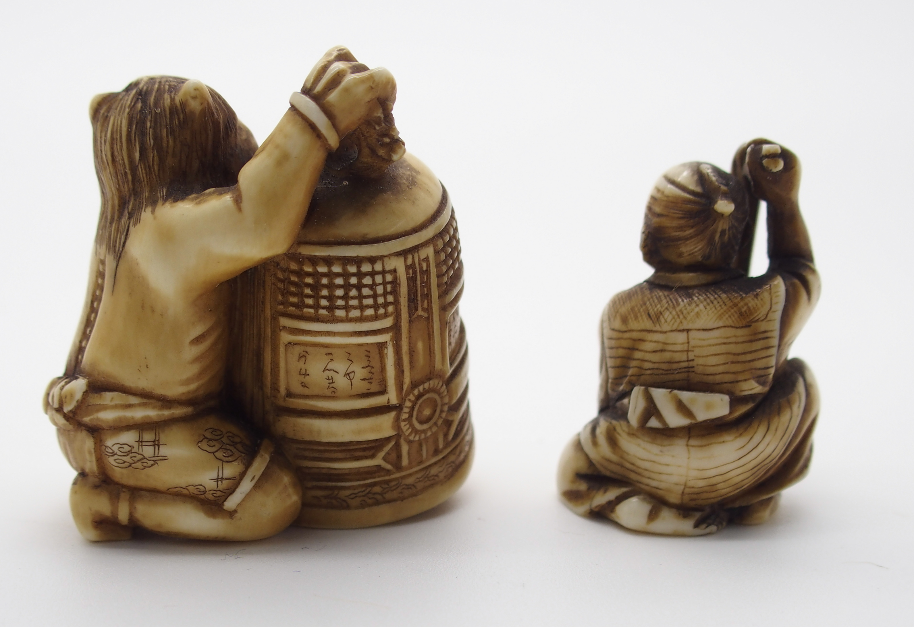 A JAPANESE IVORY OKIMONO ONI holding a temple bell enclosing another demon, 5cm high, a netsuke of a - Image 3 of 10